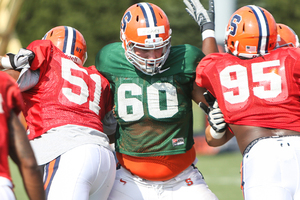 Sean Hickey (60) will make his debut on Syracuse's new-look offensive line this weekend. Injuries and departures have forced inexperienced players like Hickey to step into starting roles.