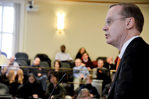 Syracuse University Chancellor Kent Syverud speaks at Wednesday's University Senate meeting. Syverud addressed the recent NCAA report and disputed some of its findings. 