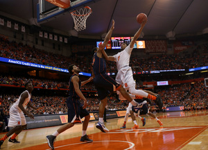 Michael Gbinije hit 5-of-9 3s and had a team-high 24 points against Virginia on Sunday.