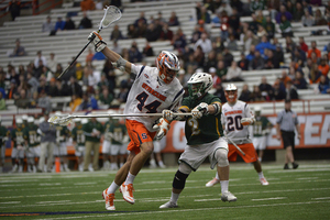 Matt Lane works on a Siena Saints defender in SU's blowout win last year. All seven of Siena’s top players in goals-scored return. 