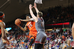 Tyus Battle hangs in the air for a layup.