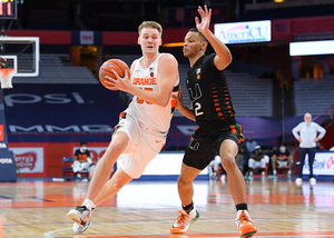 Buddy Boeheim drives to the net in Syracuse's second ACC win this season.