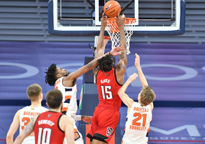 Manny Bates drives to the net against Syracuse in the Carrier Dom on Jan. 31, 2021.