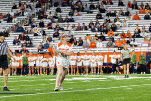 Maddy Baxter looks forward to make a pass against Stony Brook. In Syracuse's 12-0 start this season, Baxter has notched 14 points and 12 goals. 