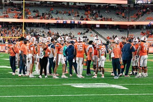 Syracuse faces South Florida in the Boca Raton Bowl Thursday. Our beat writers are split on whether the Orange will come out with a win.