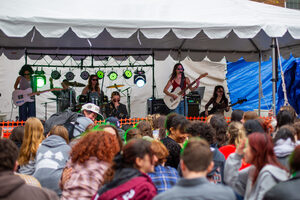 Grace Ferguson who is part of the “Luna and The Carpets” duo instructed the crowd to “get low” during the build-up in “Liar,” one of their songs. The band was performing at Walnutpalooza — where students enjoyed music all afternoon for charity. 
