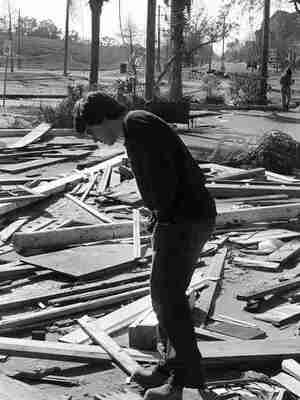 David Poliner surveys the wreckage of former homes in a depressed area of New Orleans near Lake Pontchartrain.