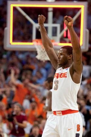 Dion Waiters celebrates Syracuse's win over Wisconsin in the Sweet 16 on Thursday.