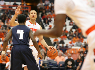 Brandon Triche directs Syracuse's offense. 