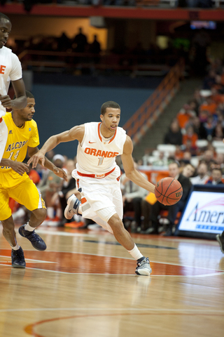 Michael Carter-Williams pushes the ball up the floor.