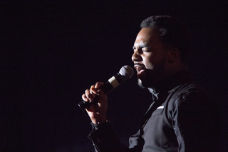 A member of Syracuse University's Martin Luther King Community Choir performs.