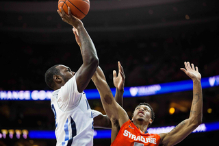 McCullough goes up for a block. He struggled on Saturday, fouling out with only three points and five rebounds.