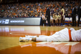 McCullough lies on the baseline after going down with an apparent knee injury. He returned to the locker room and was ruled out for the game.