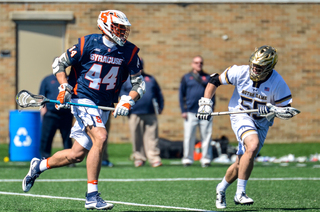 Matt Lane works to get the edge on a UND defender. 