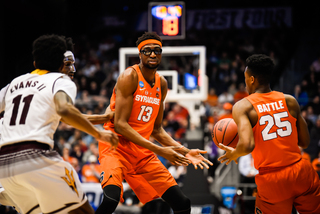 Chukwu hands the ball over to Battle. The Orange struggled to create offense off similar handoffs against ASU's active defense. 