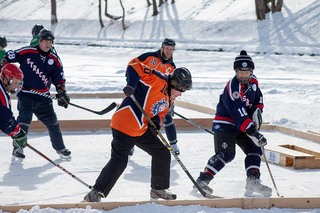 Teammates work together to score goals against their opponents and succeed in the tournament. 